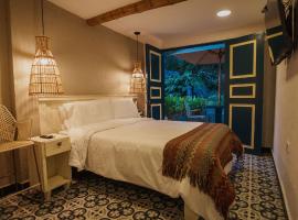 Cocli Hotel Boutique Salento，位于萨兰托的带按摩浴缸的酒店