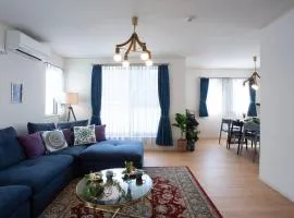 エメラルド色に輝く希望ヶ丘ビーチまで徒歩圏内！リゾート地恩納村のお洒落な3LDK一軒家貸し切り！