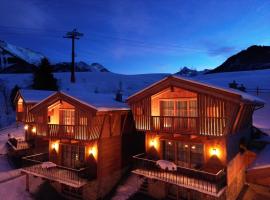 Chalet Village Zaglgut - Wellness - Panoramic View, Ski-in Ski-out to Kitzsteinhorn，位于卡普伦的酒店