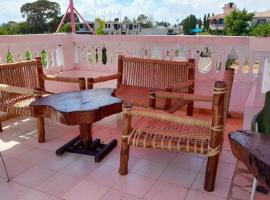ZARADISE SUITES HOTEL, MOMBASA KENYA，位于蒙巴萨的酒店