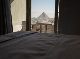 WOW Pyramids Inn，位于开罗的酒店