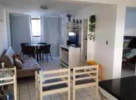 Apartamento azul no condomínio Mar de Cotovelo