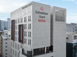 Hotel Schweizer Dorf Cheonan，位于天安市奥林门广场附近的酒店