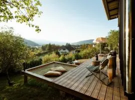 Ecolodge Acmé Jacuzzi vue lac