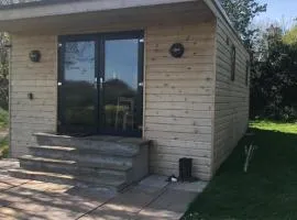 Secluded Log Cabin in beautiful private gardens