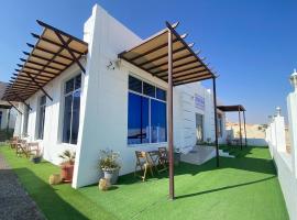 Wadi shab guest house，位于Ţīwī的酒店