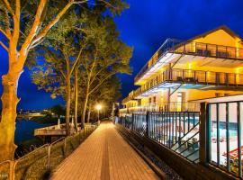 拉吉森盆纳特Spa旅馆，位于拉伊格鲁德的海滩酒店