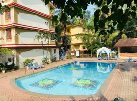 Holidays Beach Apartments Goa，位于巴加的住宿加早餐旅馆