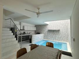 Casa privada con piscina Villa Encanto，位于卡门阿皮卡拉的酒店