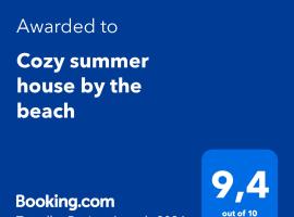 Cozy summer house by the beach，位于弗尔卡的海滩酒店