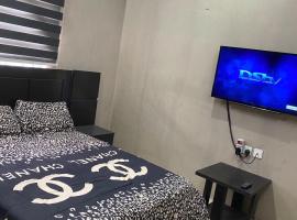DIVINE VILLA AND RESORTS HOTEL GUEST House 15 mins Near Michael Okpara University Sam Mbakwe Airport，位于Umuhu的酒店