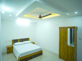 PIOUS B RESIDENCY，位于Mundakāyam的酒店