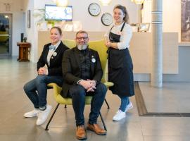 阿里斯木斯克龙酒店及公寓式酒店，位于穆斯克龙的酒店