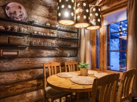 Kuusirinne 2B -A cozy cabin near the slopes of Ruka，位于鲁卡的酒店