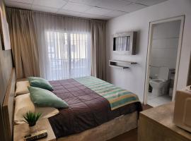 PH suites，位于里奥夸尔托的酒店