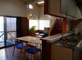 ワタリグラスハウス，位于Gamō的酒店