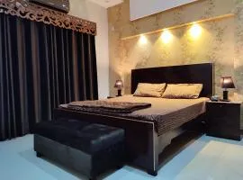 1 BR Serviced Holiday Home Near Lahore Ring Road
