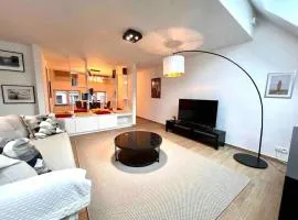 Le contemporain - Plein centre, place du Marché