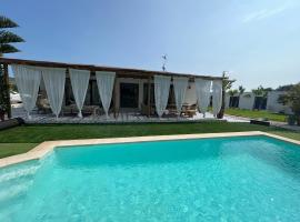 CasaNoa Luxury Villa Bed and Breakfast，位于哈维亚的度假屋
