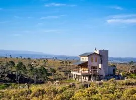 Cabañas Casa Flor Yacanto