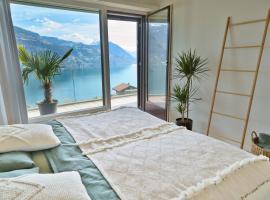 Dreamview Retreat - Breathtaking Lake Views，位于Krattigen的酒店