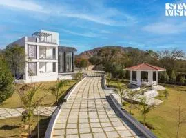 StayVista's Avadh Vatika - Mountain-View Villa with Outdoor Pool, Lawn featuring a Gazebo & Bar