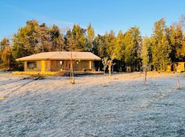 Casa en el bosque-tinaja，位于奥克泰港的乡村别墅