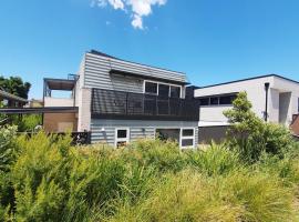 Townhouses by the Beach，位于希罗尔的酒店