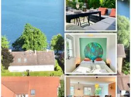 Snug Stays 1 I 3-Zimmer Design Apartment am See mit Garten I Home Office I Highspeed Wifi