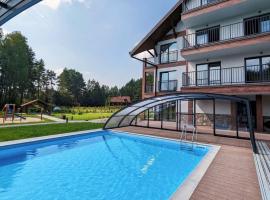 Apartamenty Sun & Snow Zapach Lasu - Naturalne SPA，位于Karwica的自助式住宿