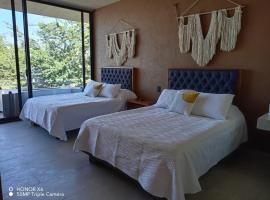 Quinta Guamuchil Acceso lago，位于特克塞丁戈的海滩酒店