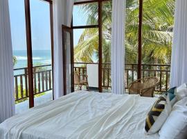 Coconut Palm beach restaurant and rooms，位于迪克韦勒的酒店