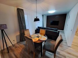 Jaukūs apartamentai centre A. J. Greimo g.，位于希奥利艾的带停车场的酒店