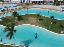Beach-Style Pool Villa Paradise，位于里奥阿托的乡村别墅