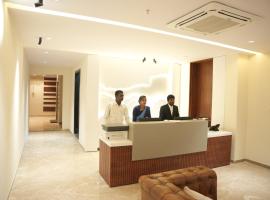 Hotel New Blue Earth，位于Srīkākulam的酒店