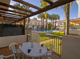 Adosado con jardin y piscina Palm Beach 86 ALBERT VILLAS，位于阿尔考斯布里的酒店