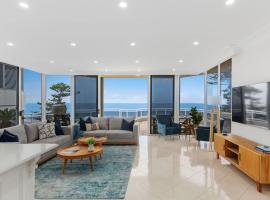 Ocean Vista Escape - A Lofty Beachfront Penthouse，位于卧龙岗的酒店