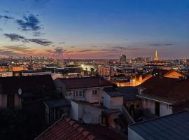 Paris Expo Porte de Versailles/Vue Tour Eiffel，位于伊西莱穆利诺的别墅