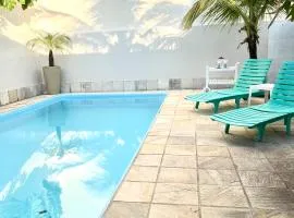 Casa com piscina em Piratininga