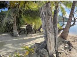 Les pieds dans l’eau à huahine. Maison climatisée，位于Parea的酒店