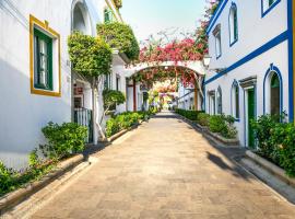 Billy's Puerto de Mogán Apartments by LIVVO，位于莫甘海滩的酒店