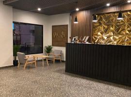 Rudolfo Suites，位于罗哈斯城的酒店