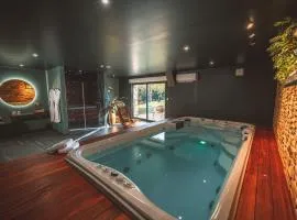 Love gite avec Spa nage privatif et espace coquin - Le Secret de l'Elixir