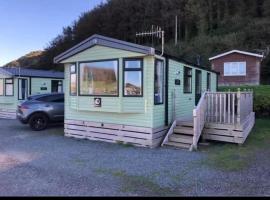 Experience Coastal Bliss in Our Fresh 2019 Sea Viev 2 Bedroom static caravan at Clarach Bay Holiday Village!，位于阿伯里斯特威斯的酒店