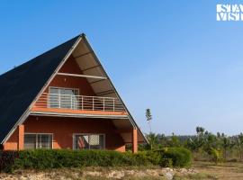 Golden Triangle by VEO - Part of StayVista，位于Hampāpura的酒店