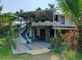 Bliss Homestay Munroe Island，位于Munroe Island的酒店