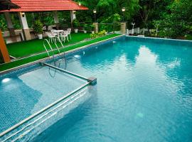 Athirappilly Rainland Resort，位于Athirappilly的酒店