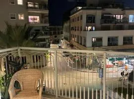Near flea market and beach