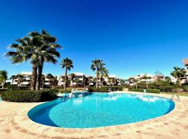 Prestigia Golf Marrakech! Rez-de-jardin 2 chambres, grande terrasse et jardin, Piscine, Parking，位于马拉喀什的分契式公寓