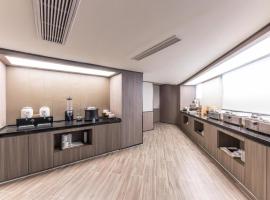 Hanting Hotel Haozhou Lixin Wanda Plaza，位于春店的酒店